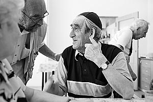 Desider Salomon, a Czech Jewish Holocaust survivor, tells a story to Tomas Haas Fritta, a longtime friend who pays him a visit at the Charles Jordan retirement home in Prague, Czech Republic.