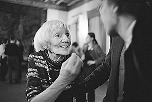 Magdalena Sterecova, a Czech Jewish Holocaust survivor and an artist, argues with a visitor of her opening exhibition at the Romanian Embassy in Prague, Czech Republic.