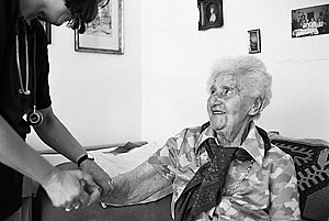 Irma Weiglova, a Czech Jewish Holocaust survivor, gesticulates as she talks to Klarka, an intern ergotherpist at the Charles Jordan retirement home in Prague, Czech Republic.