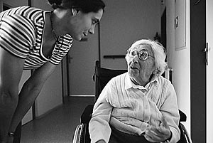 Irma Weiglova, a Czech Jewish Holocaust survivor, gesticulates as she talks to Klarka, an intern ergotherpist at the Charles Jordan retirement home in Prague, Czech Republic.