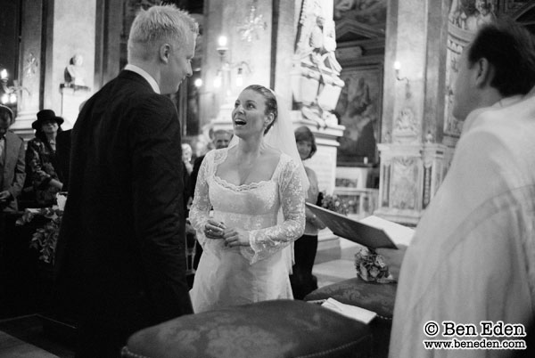 Photograph of a German couple getting wed at the Santa Maria dell'Anima church in Rome, Italy