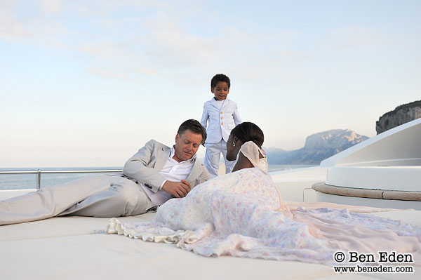 Photograph of a Bride and Groom as they relax on a yacht anchored at the Golfo di Orosei in Sardinia, Italy