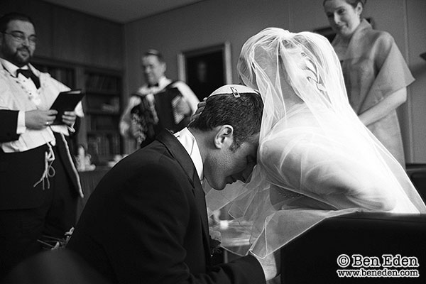 Photograph of a Jewish Bride and Groom getting ready before their wedding ceremony